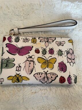 Coach White Butterfly & Beetle Print Wristlet with Pink, Yellow & Green Accents